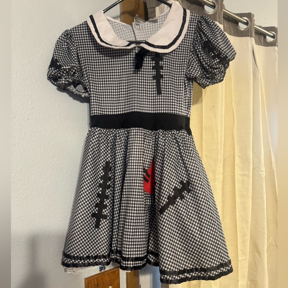 Spirit Halloween kids girl size XL wind up doll costume dress up party